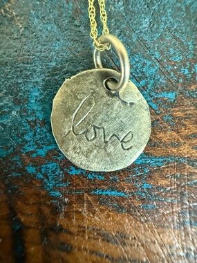 Jes MaHarry “Tender Love” dainty gold necklace.